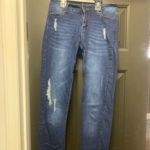 Distressed medium wash jeans